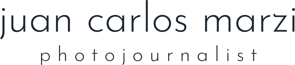 Juan Carlos Marzi Photojournalist logo